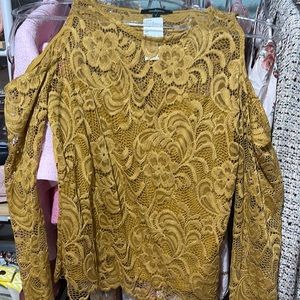 Lace top . Size large on tag but fits small/ medium